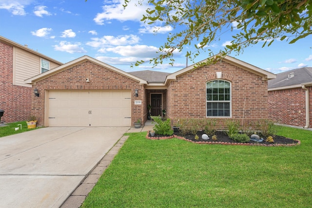 view of front facade with a front yard and a garage