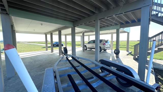 view of patio / terrace with a carport