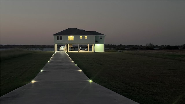 view of front of house with a lawn