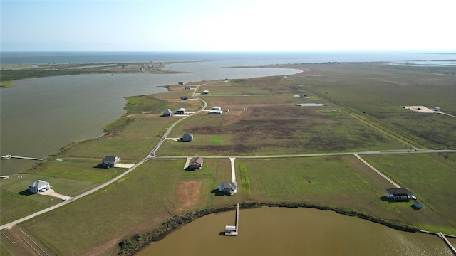 bird's eye view featuring a water view and a rural view