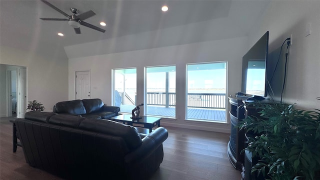 living room featuring dark hardwood / wood-style flooring and ceiling fan