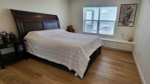 bedroom featuring hardwood / wood-style flooring