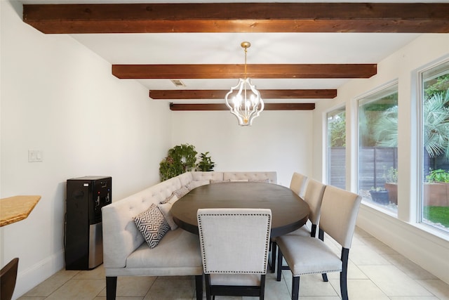 dining area with light tile patterned floors and a wealth of natural light