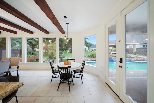 sunroom / solarium with french doors and beam ceiling