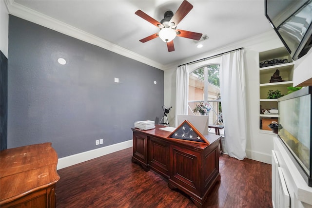 home office with dark wood-type flooring, crown molding, and ceiling fan