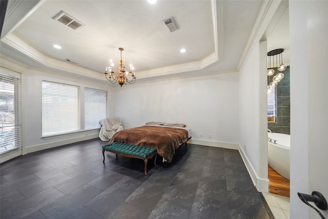 bedroom featuring crown molding, a tray ceiling, and an inviting chandelier