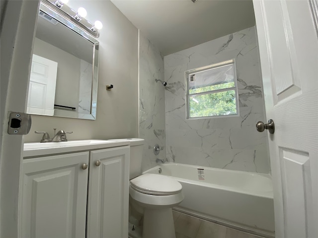 full bathroom featuring vanity, toilet, and tiled shower / bath