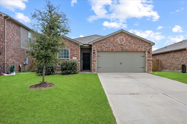 view of front of property featuring a front yard and a garage