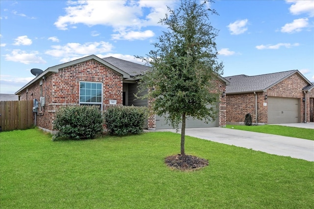 single story home featuring a front yard and a garage