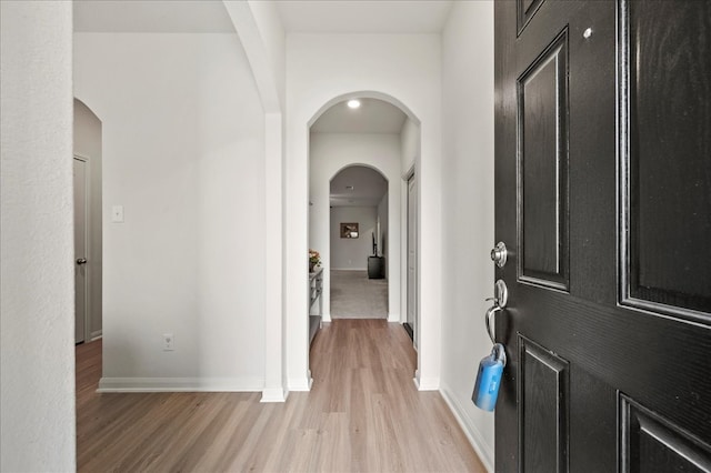 foyer entrance featuring light wood-type flooring