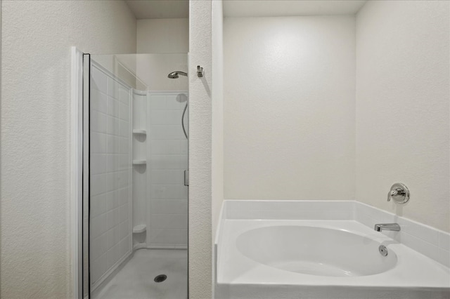 bathroom with independent shower and bath