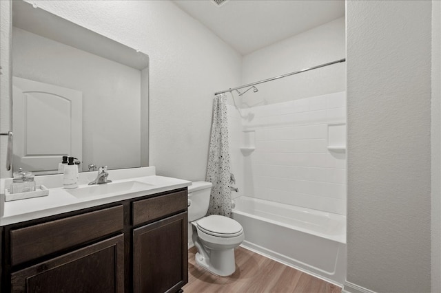 full bathroom featuring toilet, shower / bath combo, vanity, and wood-type flooring