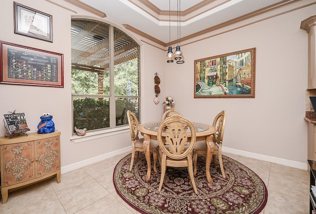 dining room with ornamental molding, light tile patterned floors, and an inviting chandelier