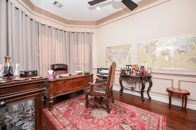 office with ceiling fan, dark hardwood / wood-style flooring, and ornamental molding