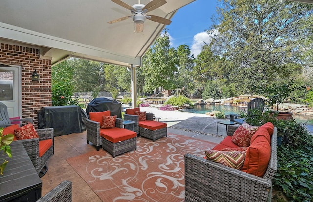 view of patio featuring outdoor lounge area, ceiling fan, and a grill