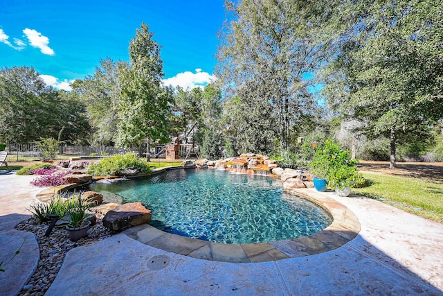 view of swimming pool with a patio