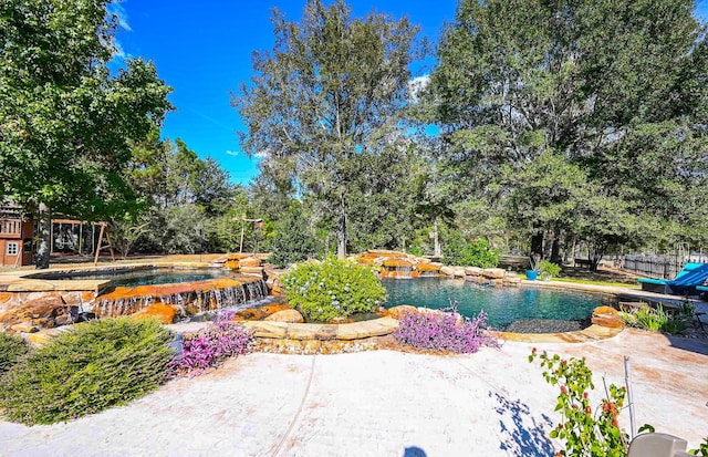 view of pool with a patio