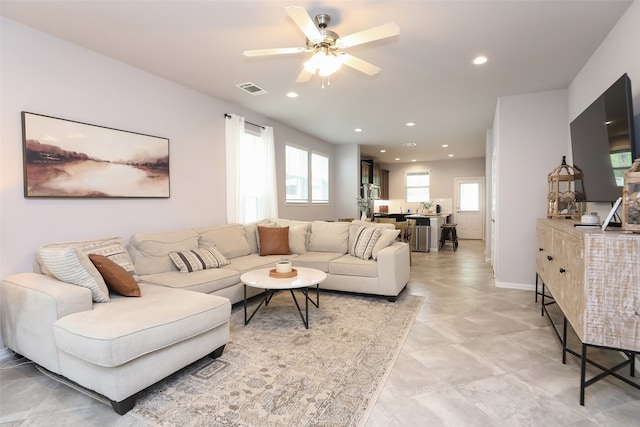 living room with ceiling fan