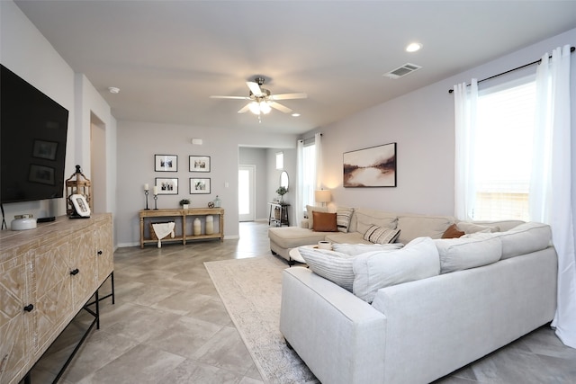 living room with ceiling fan