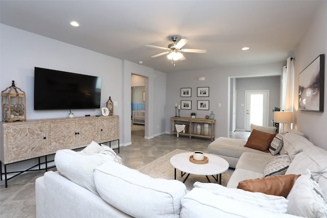 living room featuring ceiling fan