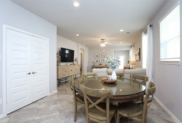 dining area with ceiling fan