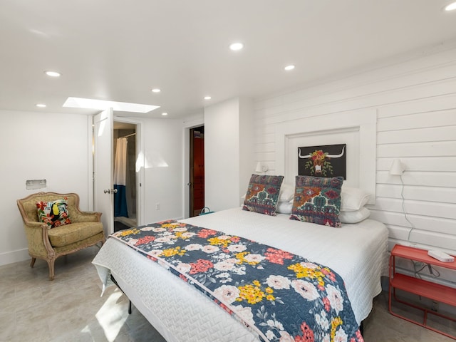 bedroom featuring a skylight