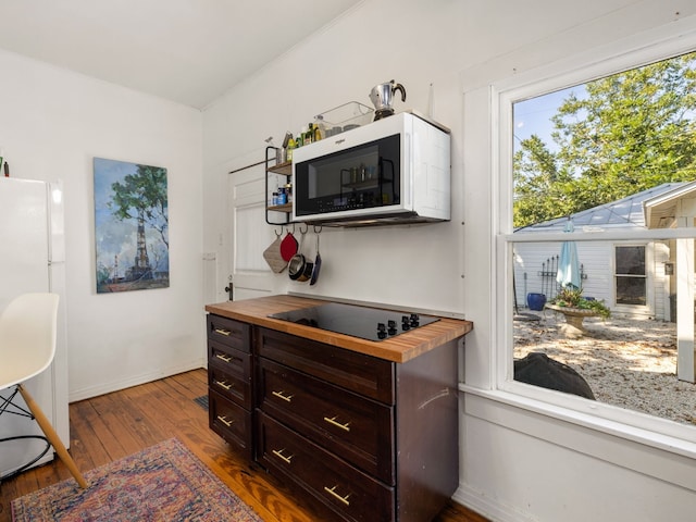 interior space with dark hardwood / wood-style floors