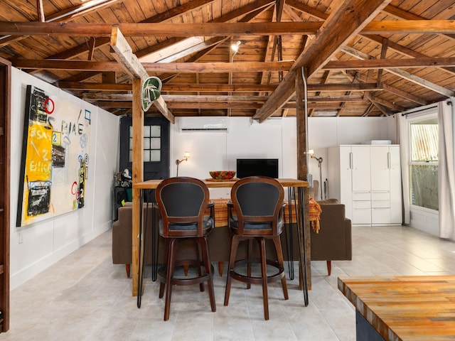 dining room with an AC wall unit, wooden ceiling, light tile patterned floors, and vaulted ceiling with beams