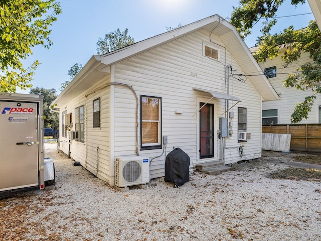 view of front facade featuring ac unit