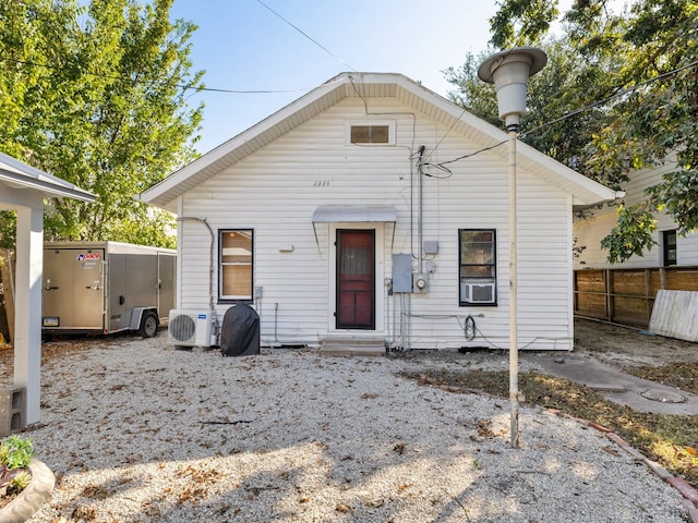 view of front of house with ac unit