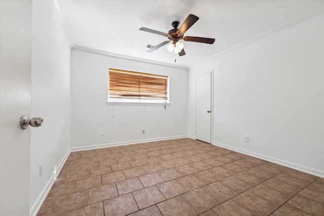 spare room featuring ceiling fan and ornamental molding