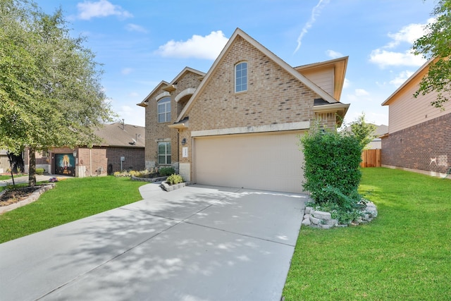 front of property featuring a front yard and a garage