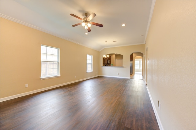 unfurnished living room featuring dark wood-type flooring, ceiling fan with notable chandelier, and crown molding