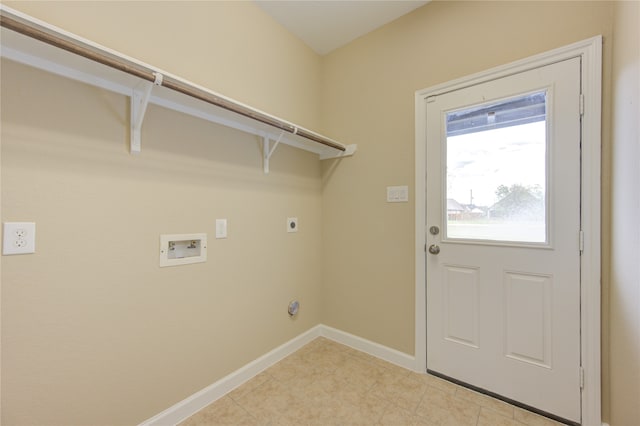 clothes washing area with washer hookup and electric dryer hookup