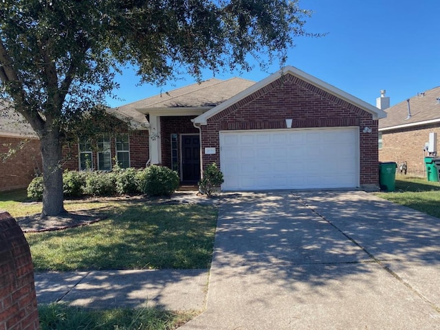 ranch-style home with a garage and a front lawn