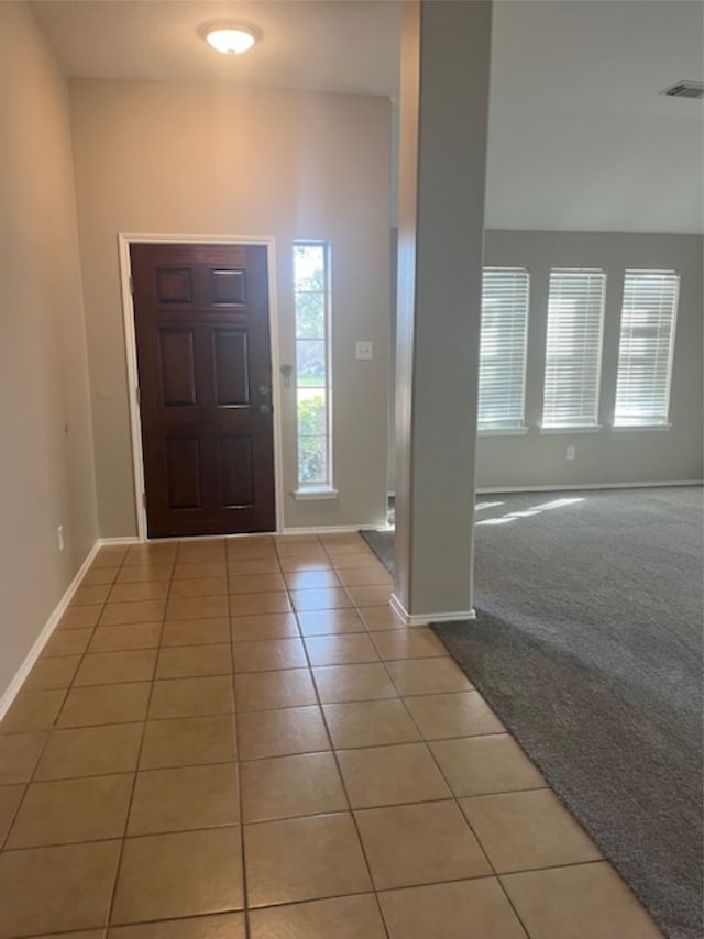 view of tiled entrance foyer