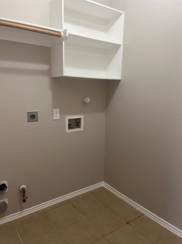 laundry area with electric dryer hookup, washer hookup, gas dryer hookup, and tile patterned floors