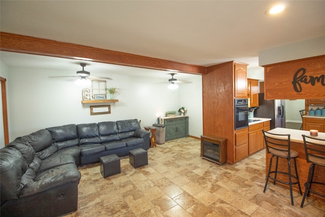 living room with ceiling fan