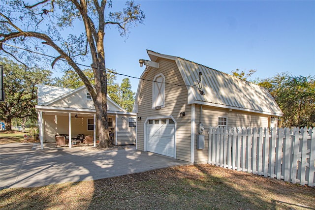 view of property exterior featuring a garage