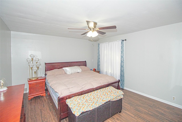 bedroom featuring dark wood-type flooring and ceiling fan