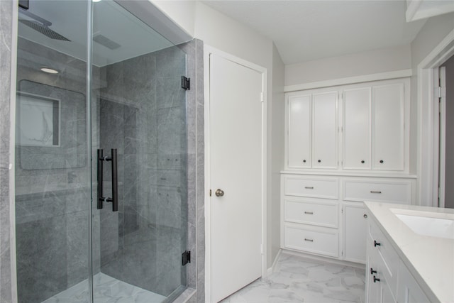 bathroom with vanity and walk in shower