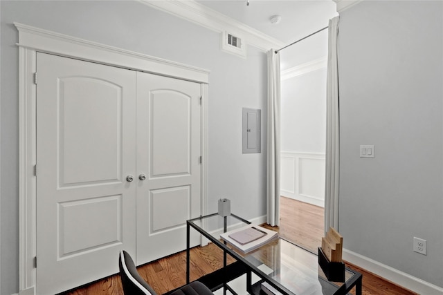 2802 Morrison St Unit 206, Houston, TX 77009 - office featuring electric panel, wood finished floors, visible vents, and crown molding