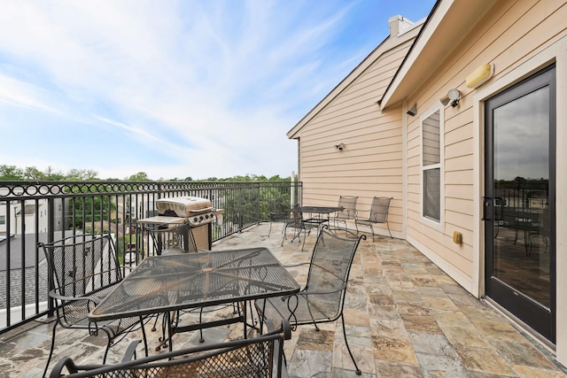2802 Morrison St Unit 206, Houston, TX 77009 - view of patio / terrace featuring grilling area and outdoor dining area