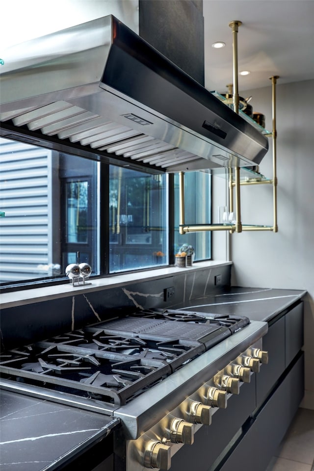 kitchen with plenty of natural light and stainless steel range