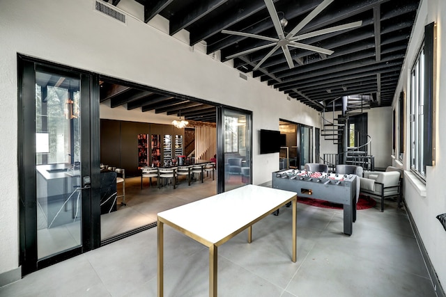 view of patio with an outdoor living space and ceiling fan