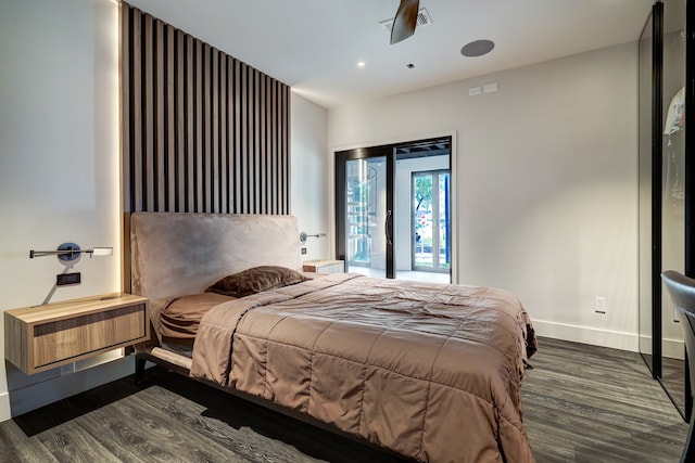 bedroom featuring dark hardwood / wood-style flooring