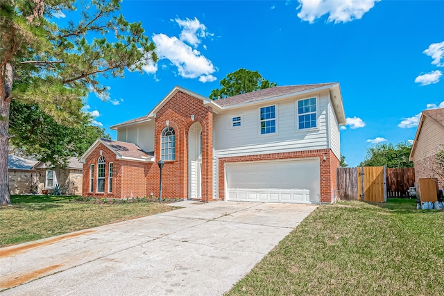 view of front of property featuring a front yard and a garage