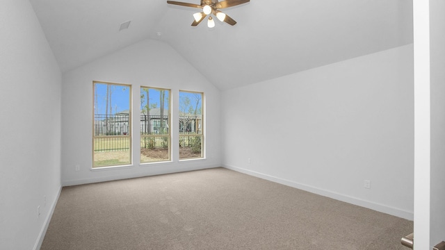 additional living space with vaulted ceiling, ceiling fan, and carpet