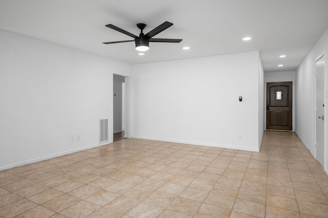 empty room featuring ceiling fan