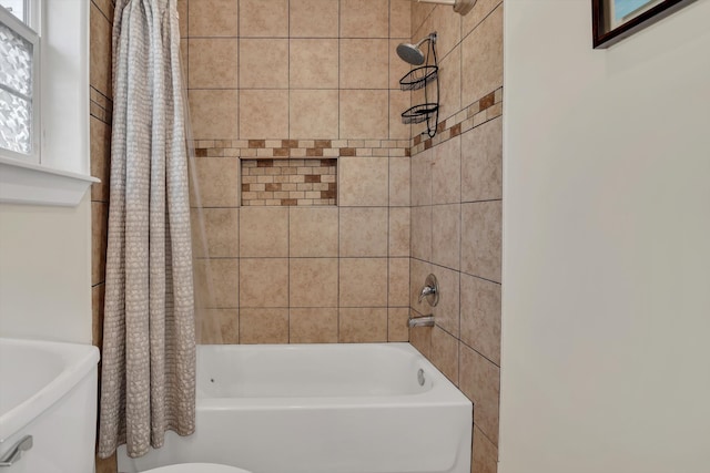 bathroom featuring shower / tub combo with curtain and a healthy amount of sunlight